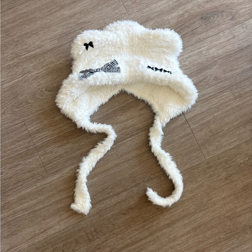Cozy White Faux Fur Earflap Hat with Bow Details